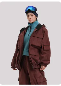 Outdoor winter ski outfit featuring brown corduroy cargo jacket with multi-pockets