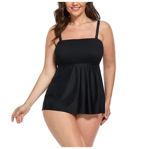Detail of black plus size bikini top with delicate spaghetti straps and smocking fabric