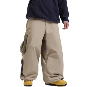 Pantalones de esquí caqui oversize con múltiples bolsillos, diseño cortavientos