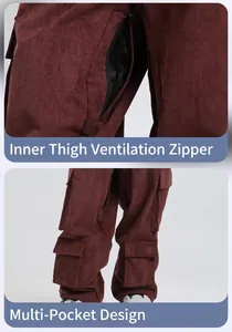 Detail of brown corduroy ski pants showing breathable thigh zippers and multi-pocket design
