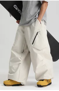 Detail of off-white waterproof cargo ski pants with side zipper pocket and utility style