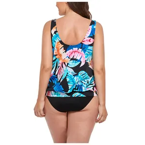Back view of two-piece tankini set featuring vibrant tropical leaf print and open back design