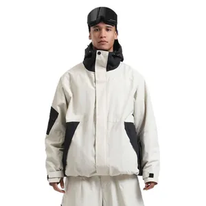 Waterproof white and black hooded ski jacket with matching pants for winter outdoor sports