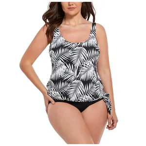 Detail of plus size tankini featuring tropical palm leaf print and side tie decoration