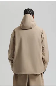Back view of khaki waterproof hooded ski jacket with ergonomic seams and minimal design