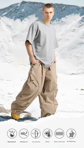 Detail view of waterproof and windproof ski pants with cargo pockets and 3D cutting features
