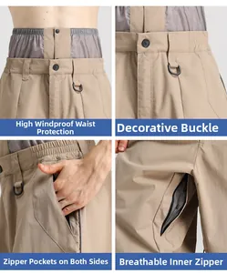 Detail view of khaki ski pants with windproof high waist, zip pockets and breathable vents