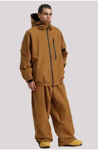 Detail of brown waterproof ski jacket with hooded utility pockets and techwear style