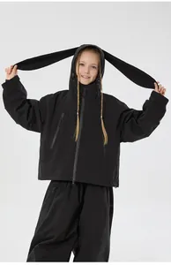 Detail of kids black hooded ski suit featuring decorative bunny ears on the hood