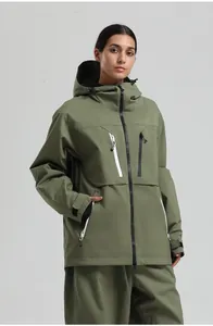 Detail of olive green waterproof ski jacket with contrast zippers and adjustable hood cuffs