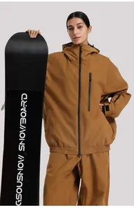 Close-up of brown waterproof ski jacket showing sealed zippers and durable fabric texture