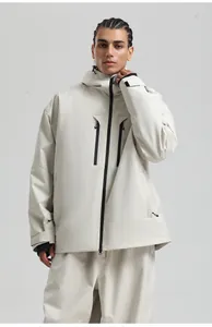 Detail of waterproof ski jacket featuring multi-zipper pockets and adjustable cuffs