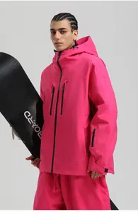Detail of waterproof zippers and adjustable cuffs on professional pink ski jacket