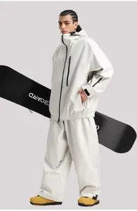 White waterproof ski suit set with hooded jacket and wide-leg pants for snowboarding
