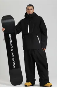 Detail view of professional black hooded ski jacket with white waterproof zipper pockets