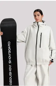 Detail view of cream white hooded ski jacket with waterproof zippers and velcro cuffs