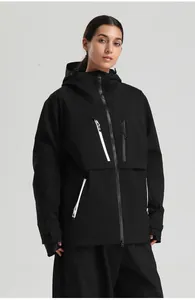 Close-up of black waterproof ski jacket featuring white contrast zippers and windproof cuffs