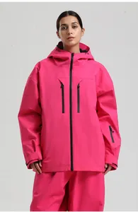 Close-up of waterproof black zippers and velcro cuffs on a rose red hooded ski jacket