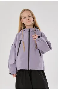 Detail of lavender kids ski jacket with black zipper pockets and adjustable velcro cuffs