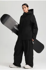 Detail of waterproof black ski suit set with functional zippers and professional venting