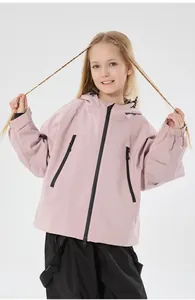 Detail of pink kids ski jacket with hood and black contrast zippers for outdoor warmth