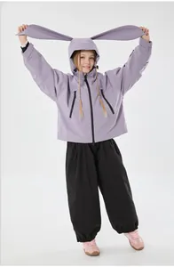 Detail of lavender kid's ski jacket with rabbit ears and waterproof fabric finish