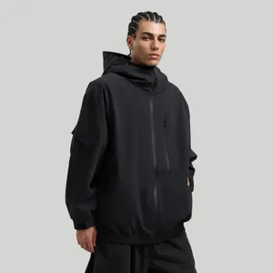 Front view of black waterproof hooded ski jacket with tactical pockets and matte finish