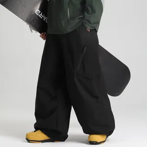 Waterproof oversized black ski pants with cargo pockets and windproof material for outdoors