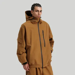 Waterproof earth brown hooded ski jacket with black tactical zippers for outdoor sports