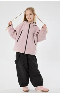 Girl's pink windproof hooded ski jacket and black cargo pants set for outdoor sports