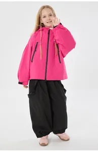 Detail of pink hooded ski jacket with black suspender pants for kids outdoor winter sports