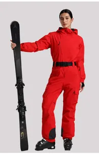 Detail of red women's ski suit with waterproof pockets and adjustable black waist belt
