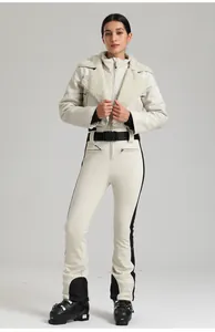 Ensemble de ski femme crème avec veste à col en polaire et pantalon ajusté avec ceinture