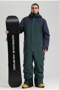 Combinaison de ski pour homme bleu foncé avec poignets réglables et bottes de neige jaunes