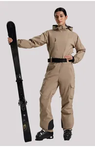 Detail of waterproof one-piece ski suit featuring windproof hood and tactical pockets