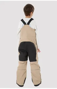 Detailed back view of kids' ski bib with reinforced patches and reflective safety strips