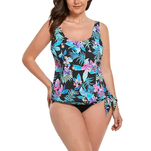 Plus size two-piece tankini swimsuit with tropical floral print and black bikini bottom