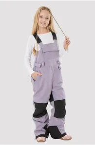Detail of kids lavender ski overalls with reinforced black knee patches and adjustable straps