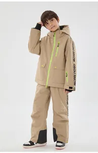 Detail of kids ski suit showing waterproof fabric, neon zippers and lettered tape