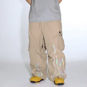 Men's khaki loose cargo ski pants with reflective flame print and wide-leg design