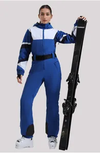 Detail of slim-fit one-piece ski suit with GSOU SNOW waist belt and windproof fabric