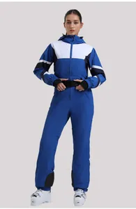 Detail of slim-fit one-piece ski suit with blue and white color-block design and belt