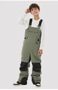 Kids waterproof ski overalls with adjustable buckled straps and durable knee patches