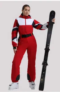 Detail of waterproof one-piece ski suit with color blocking and adjustable waist belt