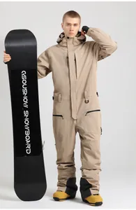 Detail view of khaki one-piece ski suit with waterproof zippers and windproof hood