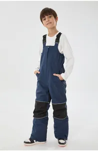 Dettagli della salopette da sci blu per bambini con spalline e strisce riflettenti