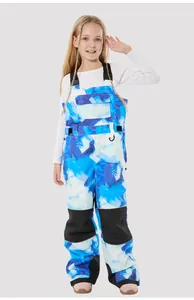 Kids' ski bibs featuring waterproof abstract blue print and reinforced knee panels