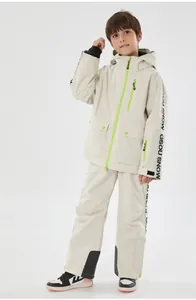 Kids insulated ski suit set featuring white hooded jacket and pants with green zipper details