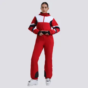 Women's slim fit one-piece ski suit in red color with waterproof hooded design