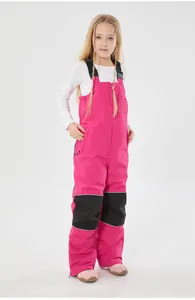 Pantaloni da sci rosa per bambini con rinforzi sulle ginocchia e spalline regolabili